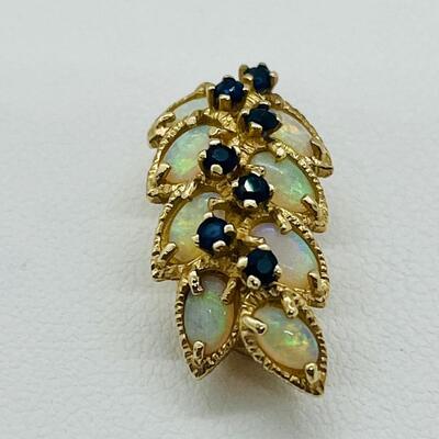 Lot 156: 14k Yellow Gold -8 Australian Opals with 7 Blue Sapphires Cluster Pendant