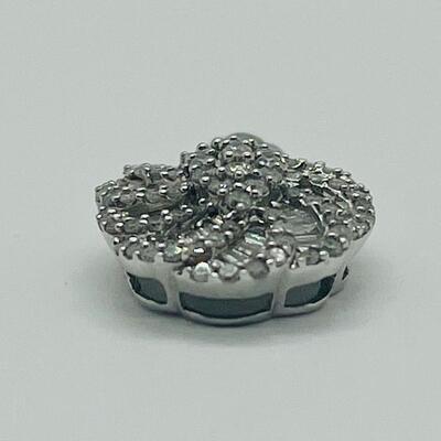 Lot 159:  5g 10k White Gold Pendant Covered in Round & Baguette White Diamonds