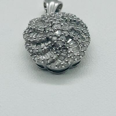 Lot 159:  5g 10k White Gold Pendant Covered in Round & Baguette White Diamonds