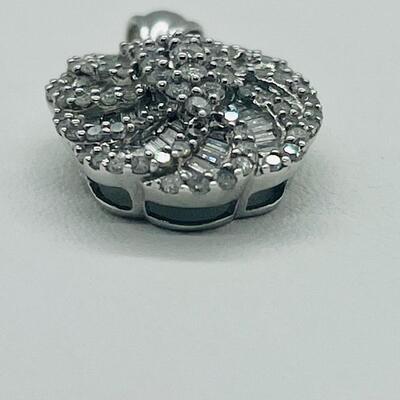 Lot 159:  5g 10k White Gold Pendant Covered in Round & Baguette White Diamonds