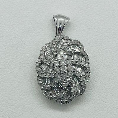 Lot 159:  5g 10k White Gold Pendant Covered in Round & Baguette White Diamonds