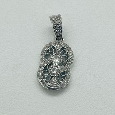 Lot 168: 18k 750 GA White Gold & Double Diamond Center of Double Circles