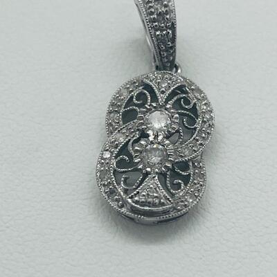 Lot 168: 18k 750 GA White Gold & Double Diamond Center of Double Circles