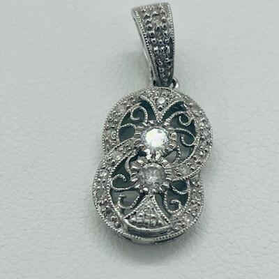 Lot 168: 18k 750 GA White Gold & Double Diamond Center of Double Circles