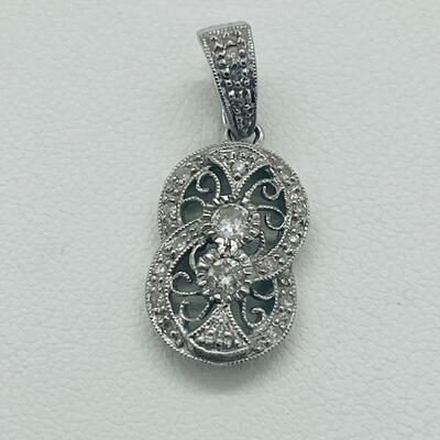 Lot 168: 18k 750 GA White Gold & Double Diamond Center of Double Circles