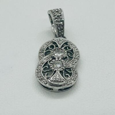 Lot 168: 18k 750 GA White Gold & Double Diamond Center of Double Circles