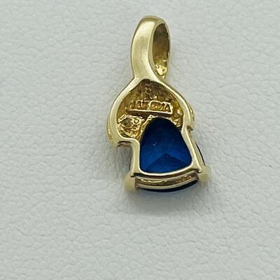 Lot 170: 14k GMA Yellow Gold & Tanzanite Pendant with 2 Diamond Chips