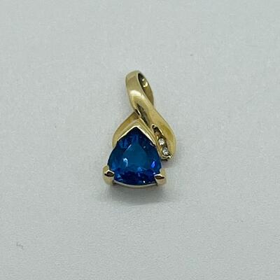 Lot 170: 14k GMA Yellow Gold & Tanzanite Pendant with 2 Diamond Chips