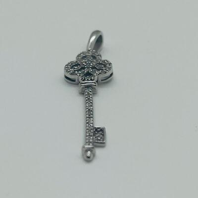 Lot 174: 14k White Gold Diamond Key Pendant