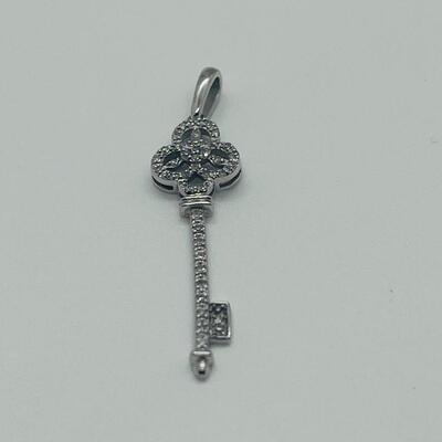 Lot 174: 14k White Gold Diamond Key Pendant