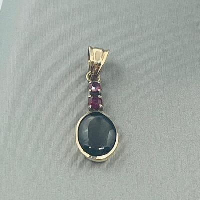 Lot 177: 18k Yellow Gold Pendant with Black Diamond & Pink Diamond Chips