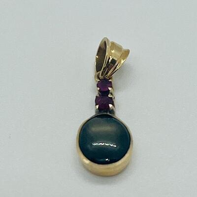 Lot 177: 18k Yellow Gold Pendant with Black Diamond & Pink Diamond Chips