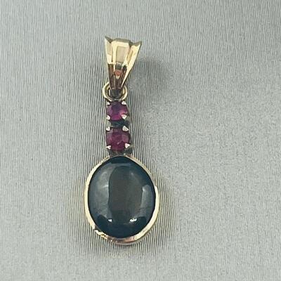 Lot 177: 18k Yellow Gold Pendant with Black Diamond & Pink Diamond Chips