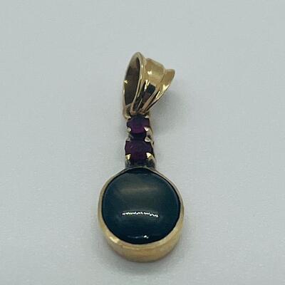 Lot 177: 18k Yellow Gold Pendant with Black Diamond & Pink Diamond Chips