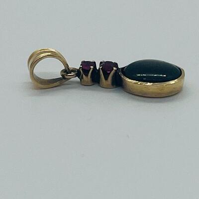 Lot 177: 18k Yellow Gold Pendant with Black Diamond & Pink Diamond Chips
