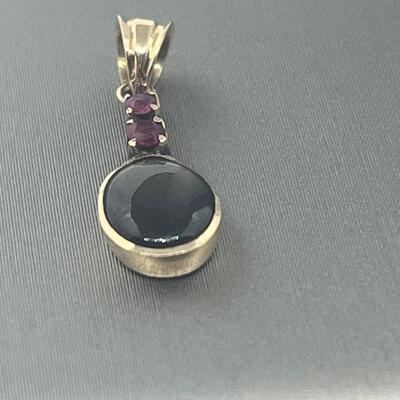 Lot 177: 18k Yellow Gold Pendant with Black Diamond & Pink Diamond Chips