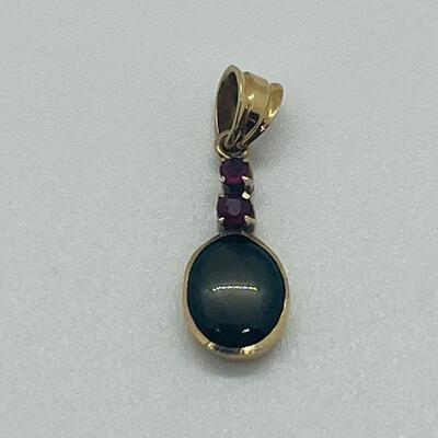 Lot 177: 18k Yellow Gold Pendant with Black Diamond & Pink Diamond Chips
