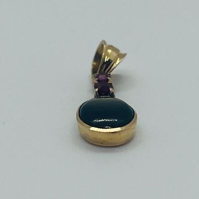 Lot 177: 18k Yellow Gold Pendant with Black Diamond & Pink Diamond Chips