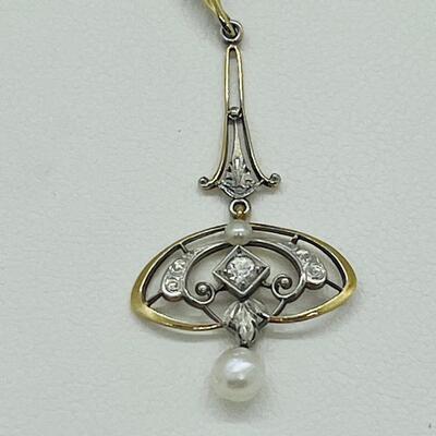 Lot 178: Vintage 14k Two-Tone Gold Pendant with Diamond center & 2 Pearls