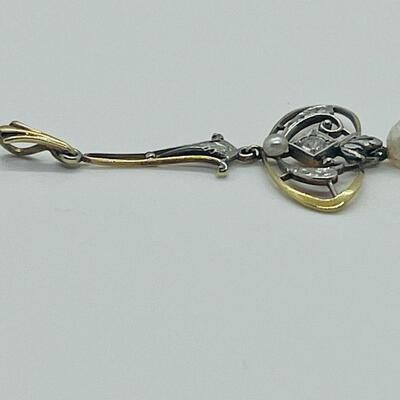 Lot 178: Vintage 14k Two-Tone Gold Pendant with Diamond center & 2 Pearls
