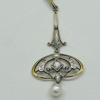 Lot 178: Vintage 14k Two-Tone Gold Pendant with Diamond center & 2 Pearls