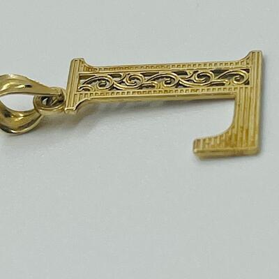 Lot 179: 10k Two-Tone Gold Letter "L" pendant