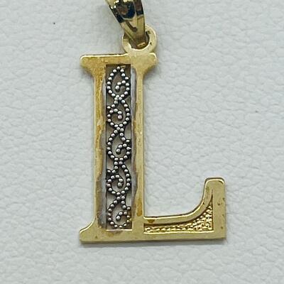 Lot 179: 10k Two-Tone Gold Letter "L" pendant
