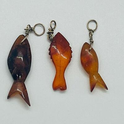 Lot 181: Amber & Jade Fish Charms