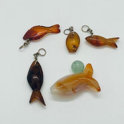 Lot 181: Amber & Jade Fish Charms