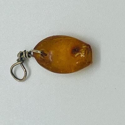 Lot 181: Amber & Jade Fish Charms