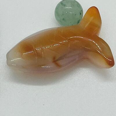 Lot 181: Amber & Jade Fish Charms