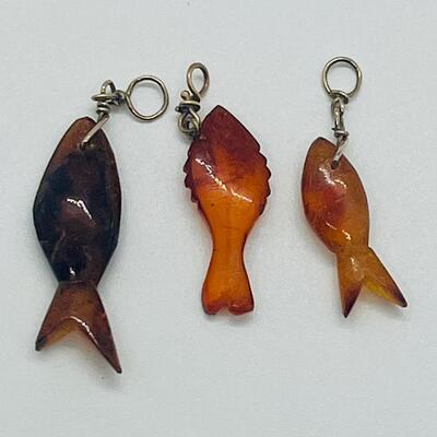 Lot 181: Amber & Jade Fish Charms