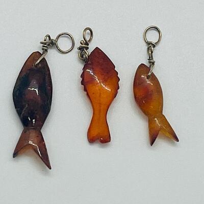 Lot 181: Amber & Jade Fish Charms