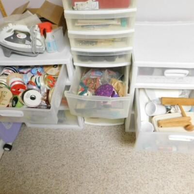Collection of Needlework and Crafting Materials and Tools includes Storage Containers