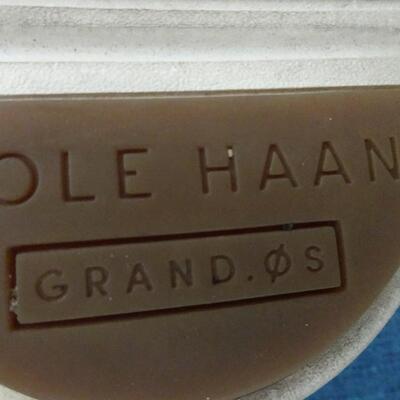 L0T 444  CROSLEY PORTABLE TURNTABLE, COLE HAAN SIZE 14 AND PLASTIC TROPHIES