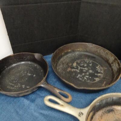 LOT 449  CAST IRON PANS