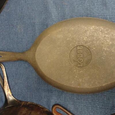 LOT 449  CAST IRON PANS
