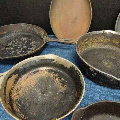 LOT 449  CAST IRON PANS