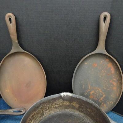 LOT 449  CAST IRON PANS