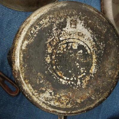 LOT 449  CAST IRON PANS