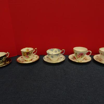 LOT 490  FIVE TEA CUP AND SAUCER SETS