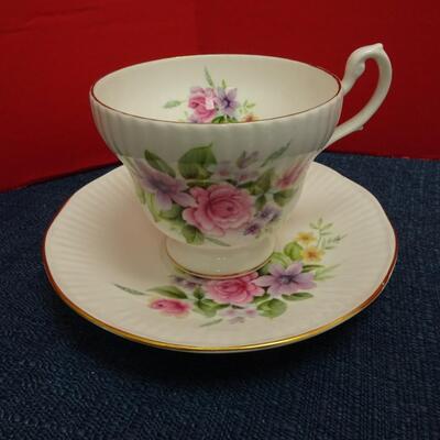 LOT 491  FIVE TEA CUP/SAUCER SETS