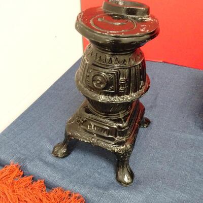 LOT 517. PLAID BLANKET, WOOD WINE BOTTLE STAND AND HOME DECOR