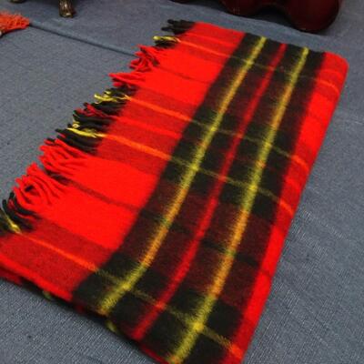 LOT 517. PLAID BLANKET, WOOD WINE BOTTLE STAND AND HOME DECOR