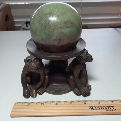 Monkeys and ball figurine