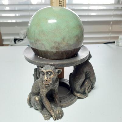Monkeys and ball figurine