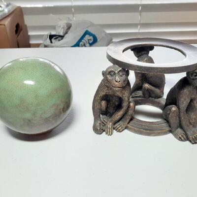 Monkeys and ball figurine
