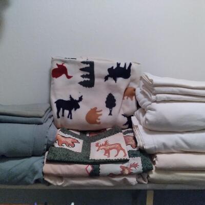 LOT 233 TOWELS AND SHEETS