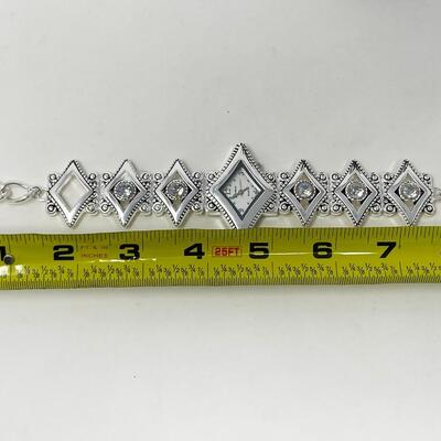 GENEVA SILVER TONED & RHINESTONE QUARTZ WATCH - WORKS