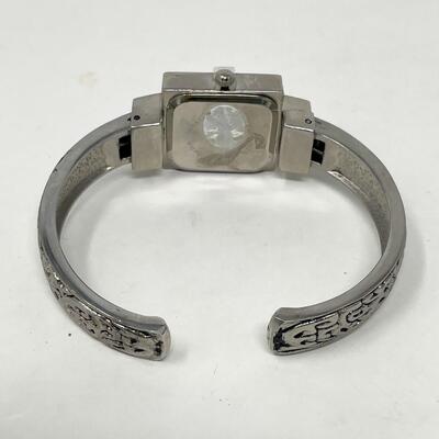 E-TIME SILVER TONED QUARTZ CUFF WATCH - WORKS